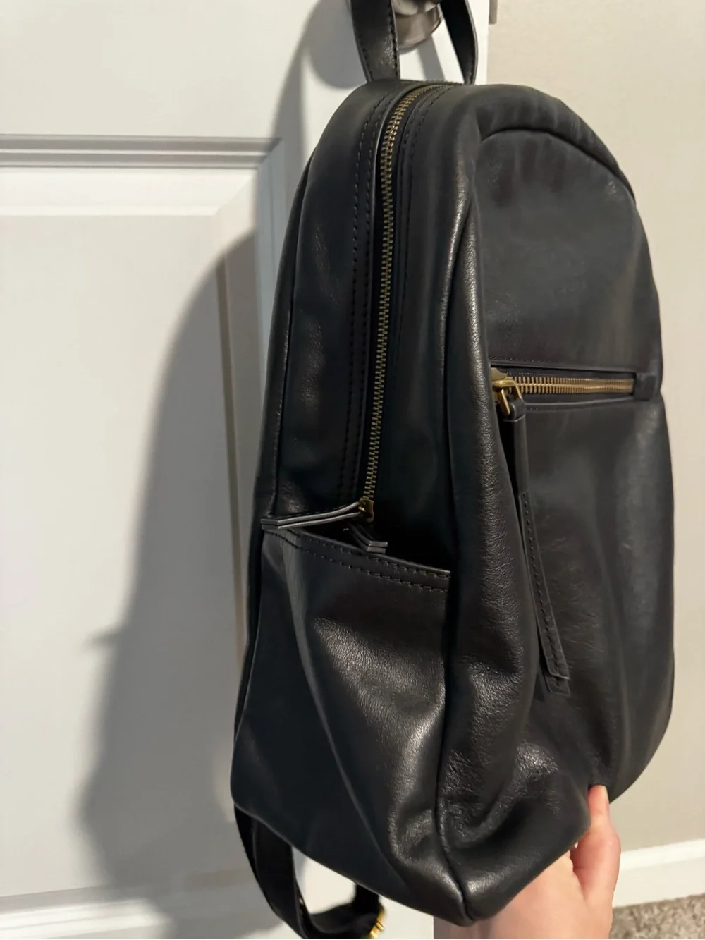 Fossil Black Leather Backpack with Gold Zip Accent